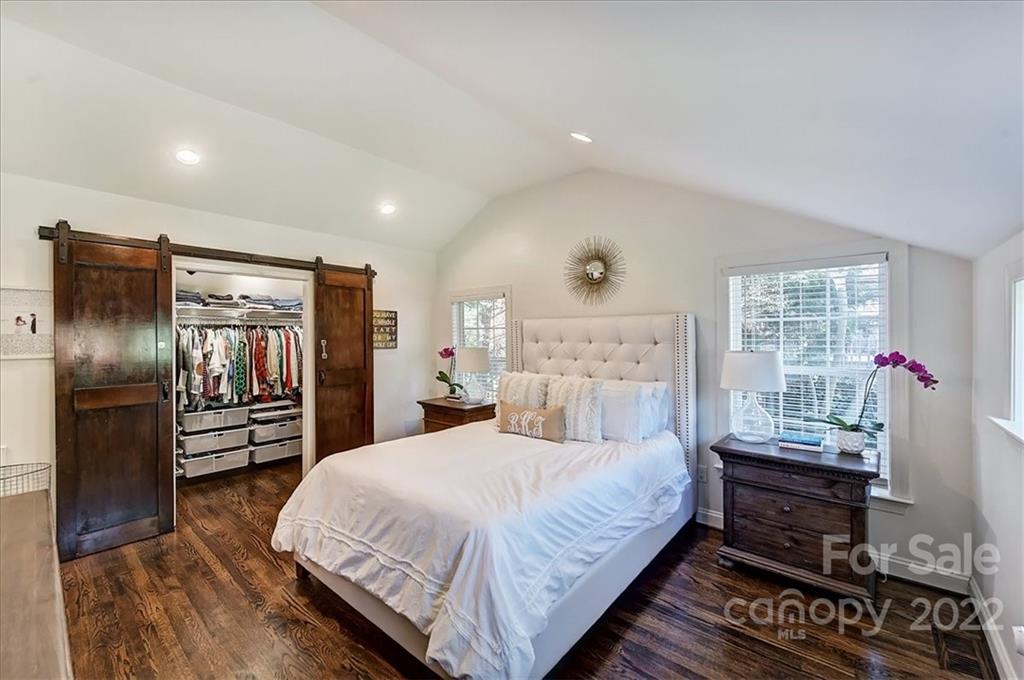 3421 Park Road Charlotte, NC 28209 - Photo 20 of 40 a bedroom with a bed and a refrigerator