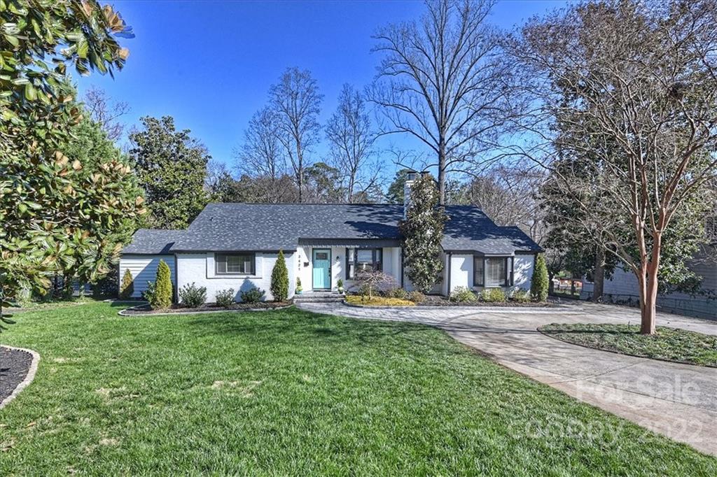 3421 Park Road Charlotte, NC 28209 - Photo 2 of 40 a front view of a house with a yard