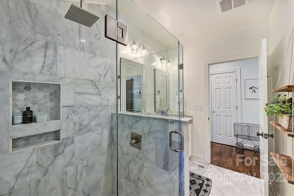 3421 Park Road Charlotte, NC 28209 - Photo 23 of 40 a bathroom with a granite countertop shower