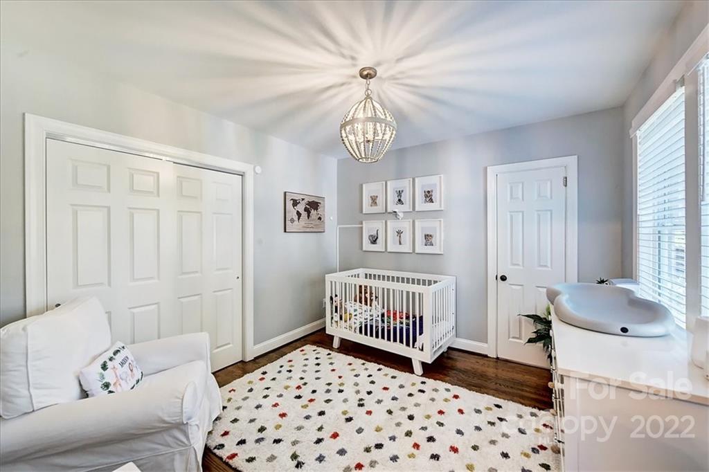 3421 Park Road Charlotte, NC 28209 - Photo 24 of 40 a bedroom with a bed and a window