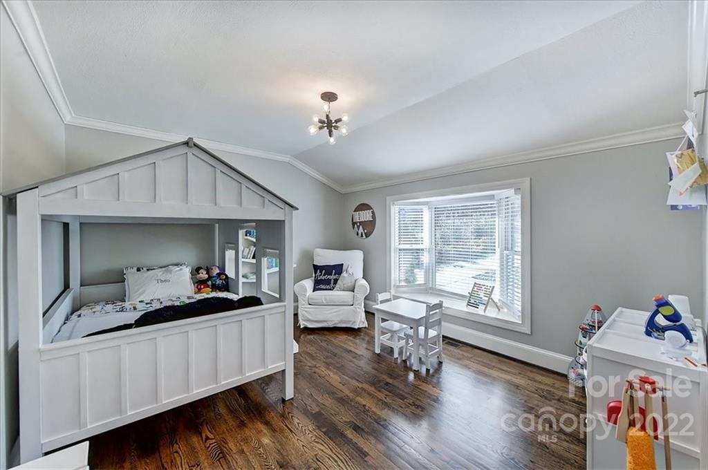 3421 Park Road Charlotte, NC 28209 - Photo 25 of 40 a bedroom with furniture and a large window