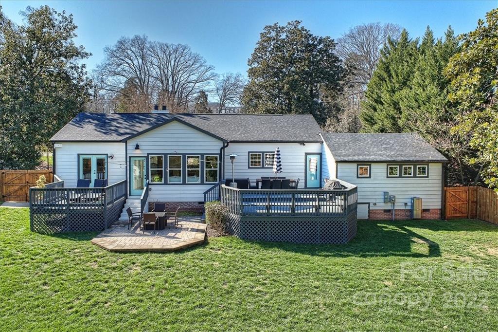 3421 Park Road Charlotte, NC 28209 - Photo 35 of 40 a front view of a house with a garden and patio