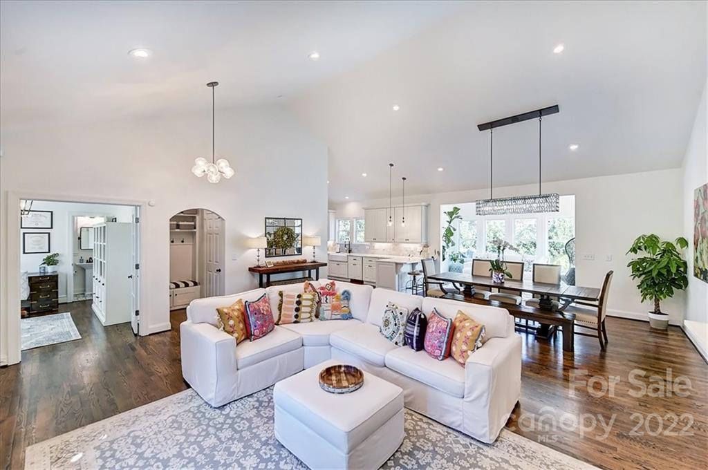 3421 Park Road Charlotte, NC 28209 - Photo 6 of 40 a living room with furniture kitchen view and a chandelier