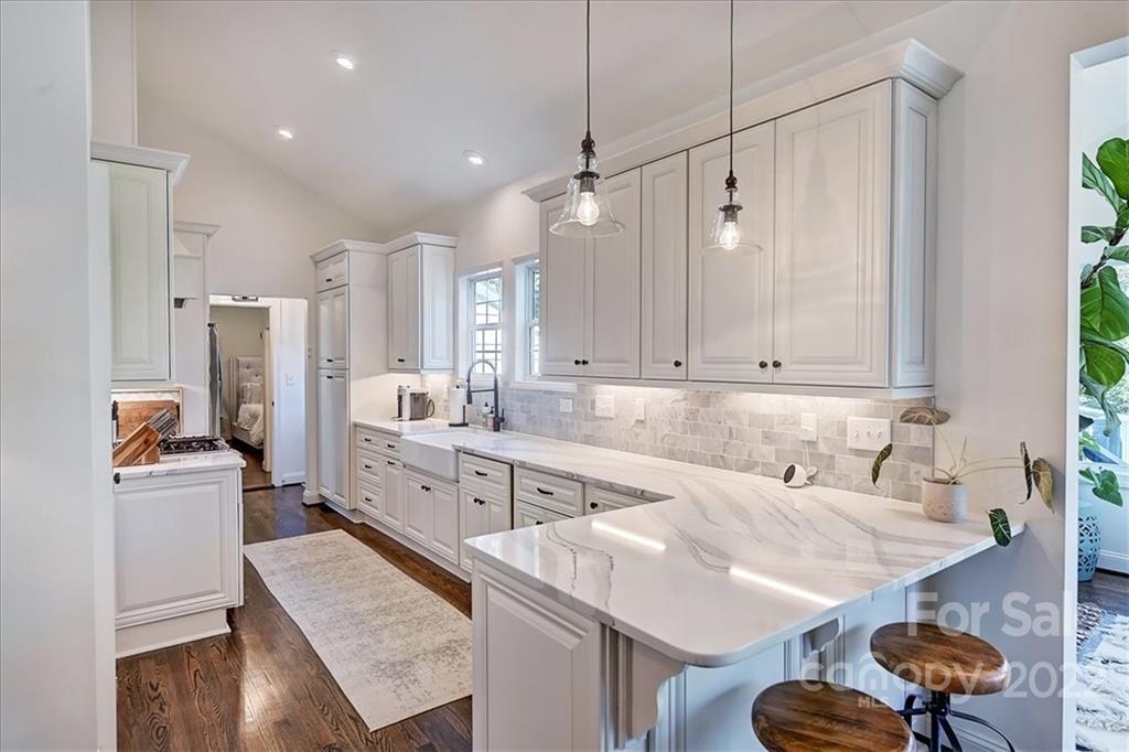 3421 Park Road Charlotte, NC 28209 - Photo 10 of 40 a kitchen with a sink appliances and cabinets