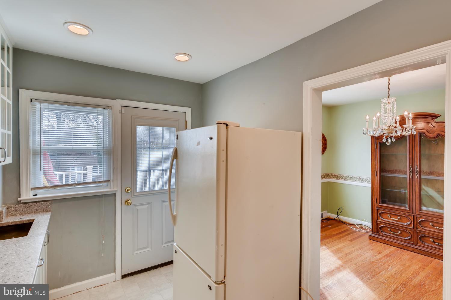 1429 Cedarcroft Road Baltimore, MD 21239 - Photo 5 of 26 Rear Door to Outdoor Deck