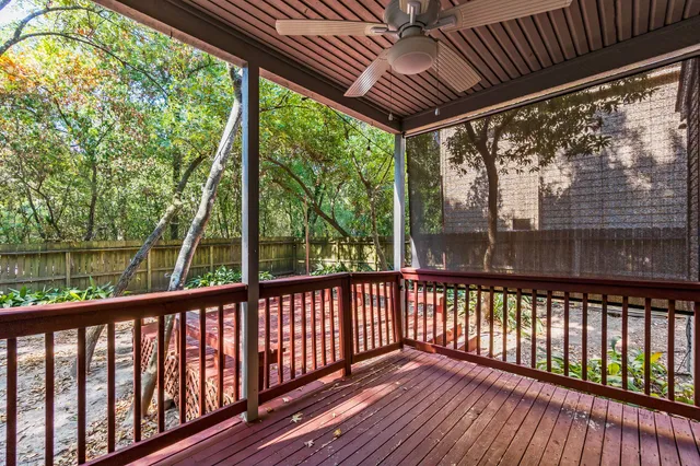 a view of balcony with wooden floor