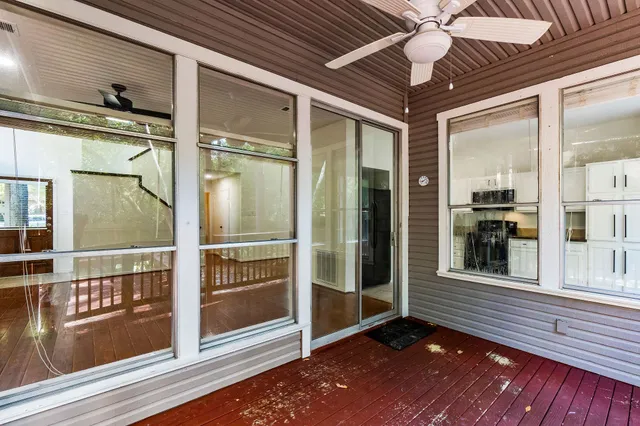 a view of a balcony with door