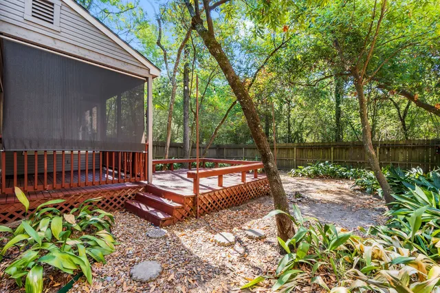 a view of a bench in a backyard