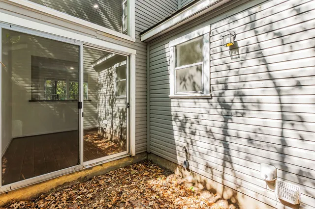 a view of a door and a window