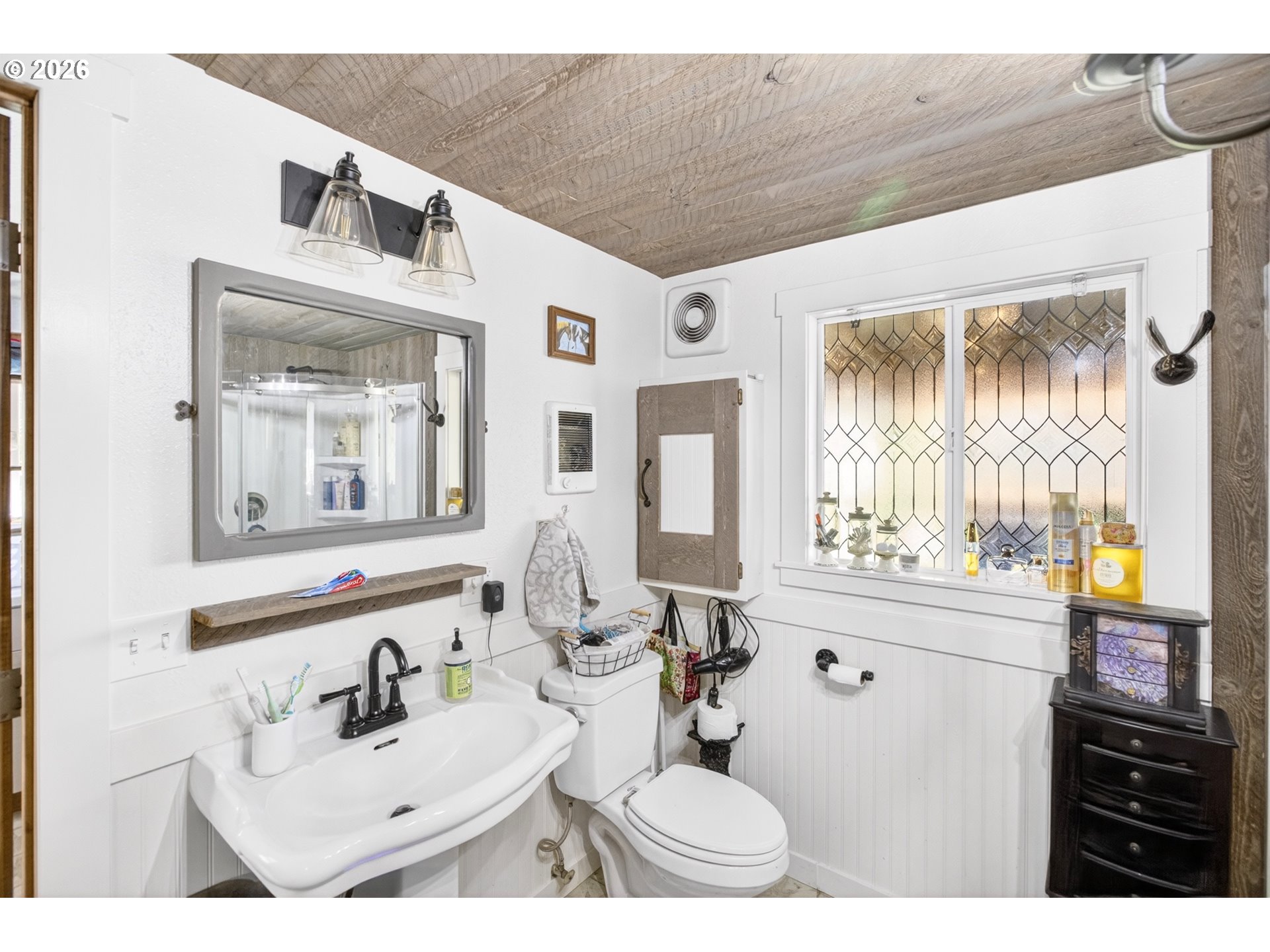 4625 Orchard Road The Dalles, OR 97058 - Photo 12 of 31 a bathroom with a sink and a mirror