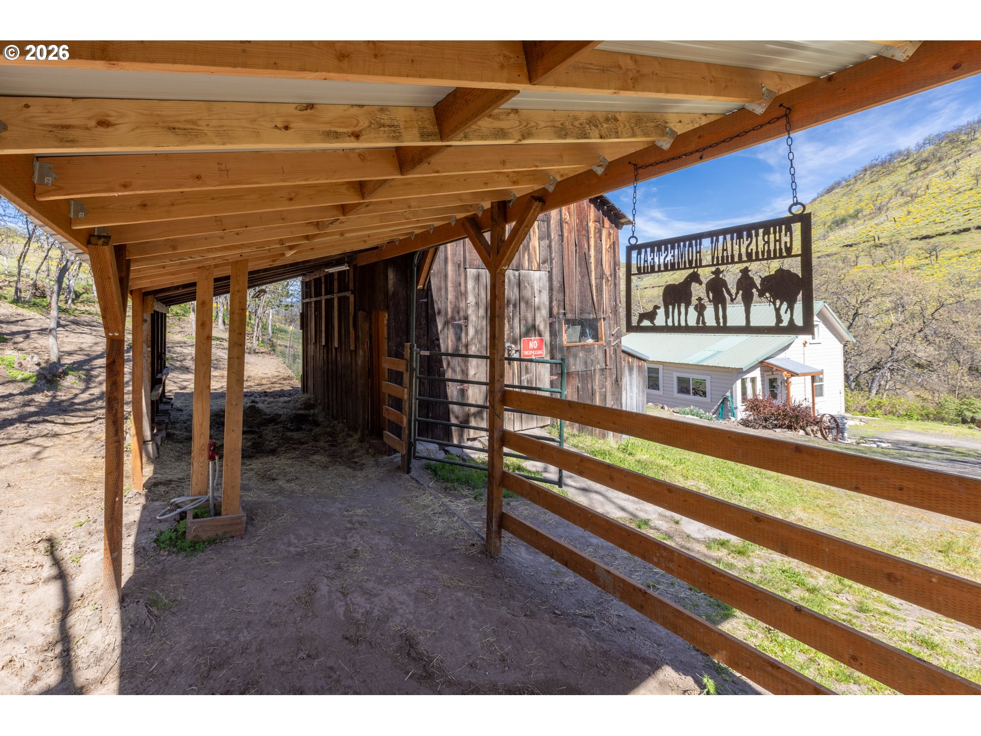 4625 Orchard Road The Dalles, OR 97058 - Photo 20 of 31 a view of a patio with a table and chairs