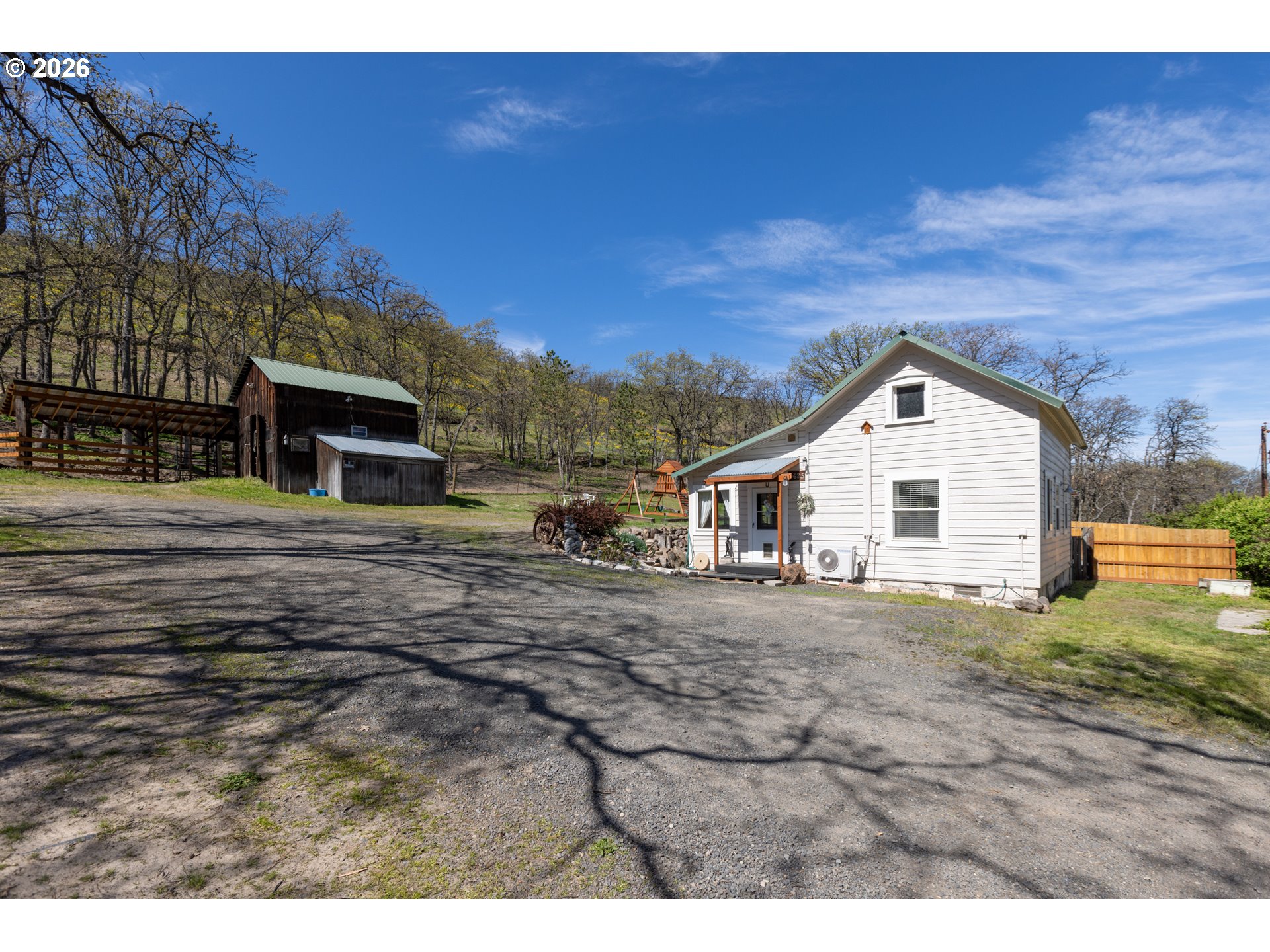 4625 Orchard Road The Dalles, OR 97058 - Photo 2 of 31 a view of a house with a yard