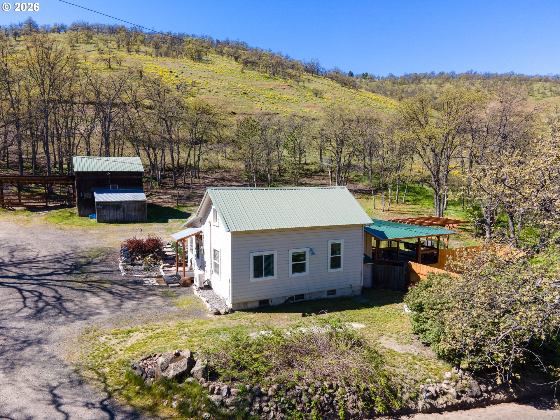 4625 Orchard Road The Dalles, OR 97058 - Photo 22 of 31 a view of a house with a yard