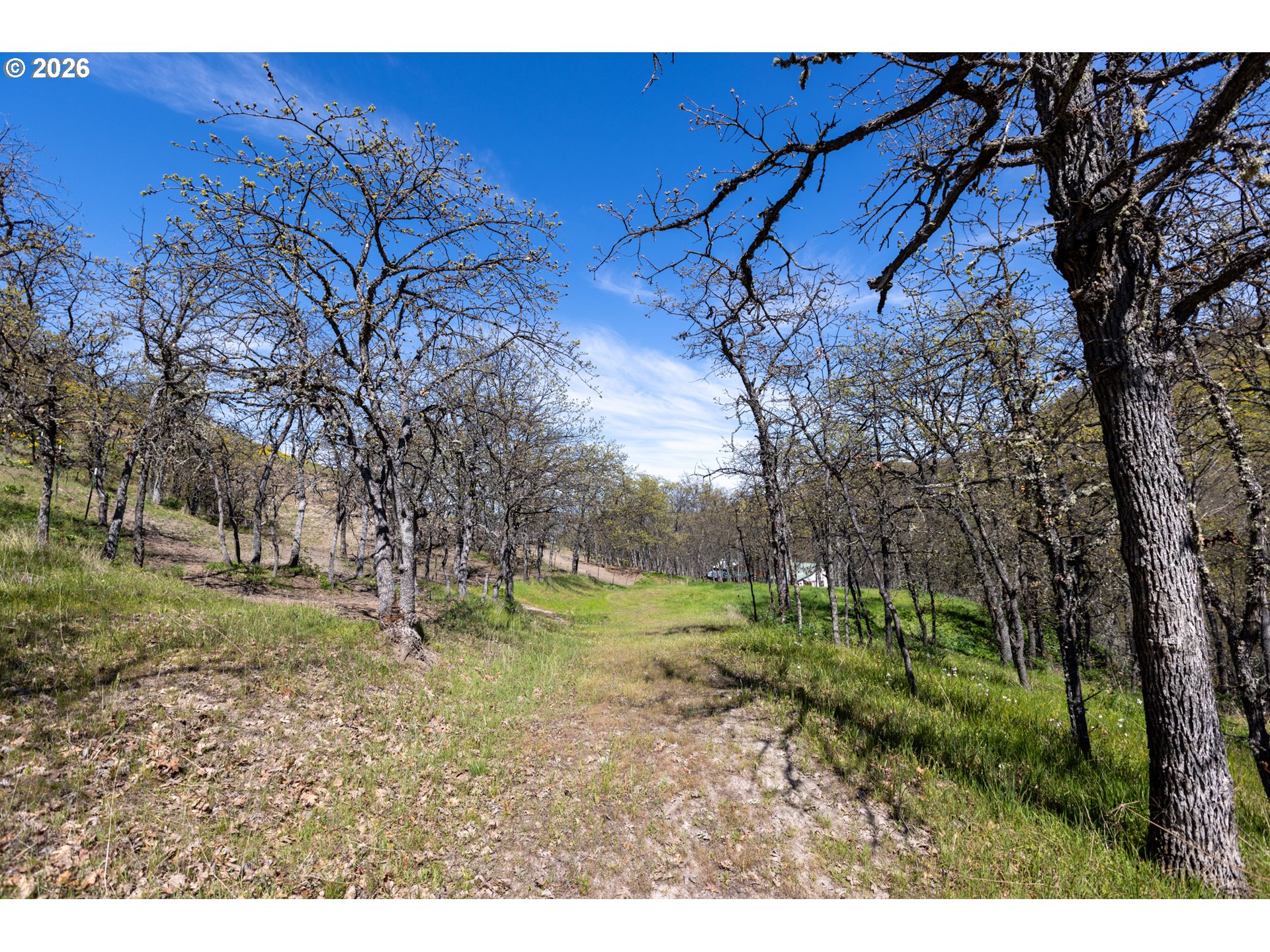 4625 Orchard Road The Dalles, OR 97058 - Photo 25 of 31 a backyard of a house with a yard and outdoor seating