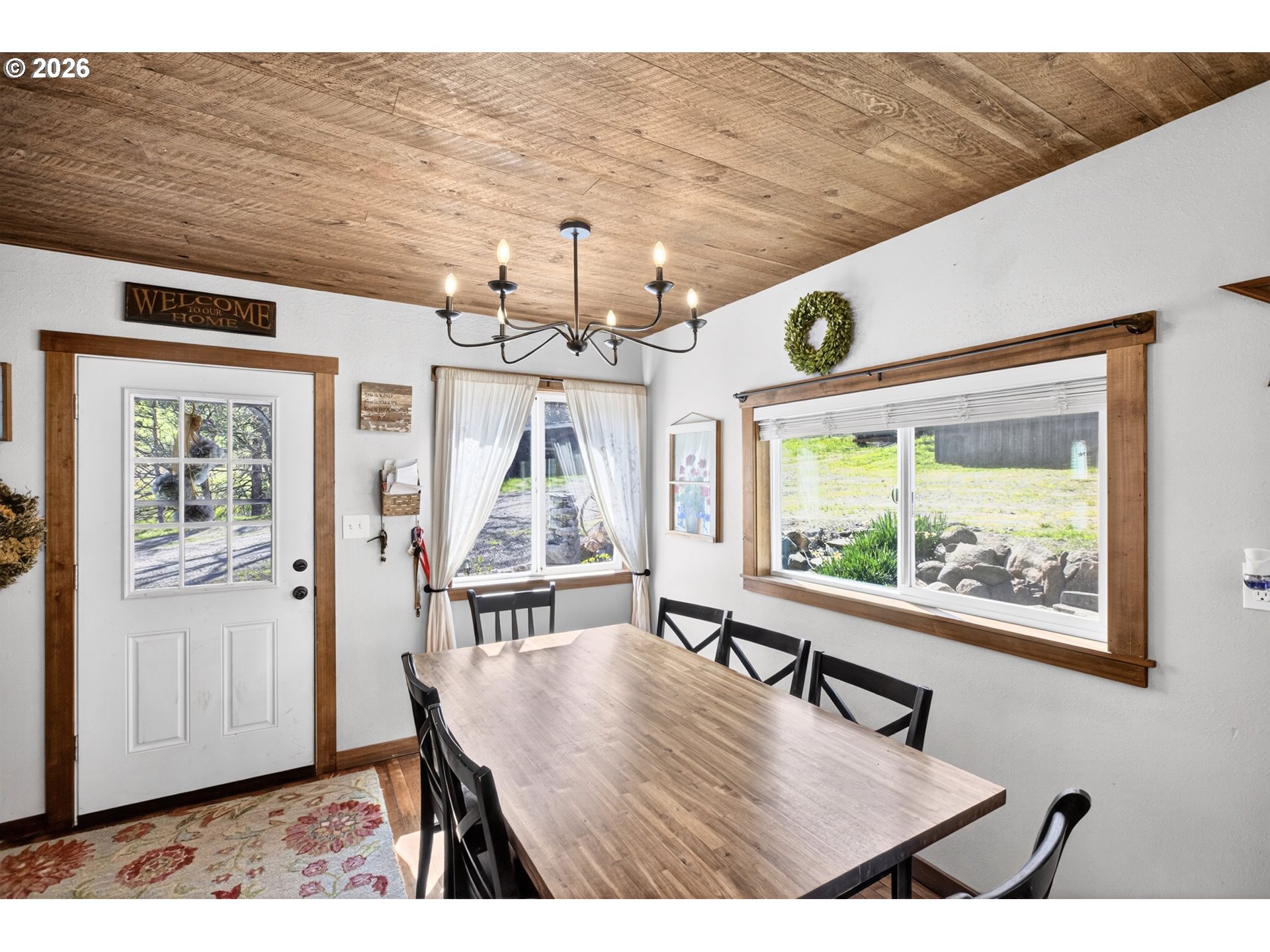 4625 Orchard Road The Dalles, OR 97058 - Photo 6 of 31 a view of a dining room with furniture window and wooden floor