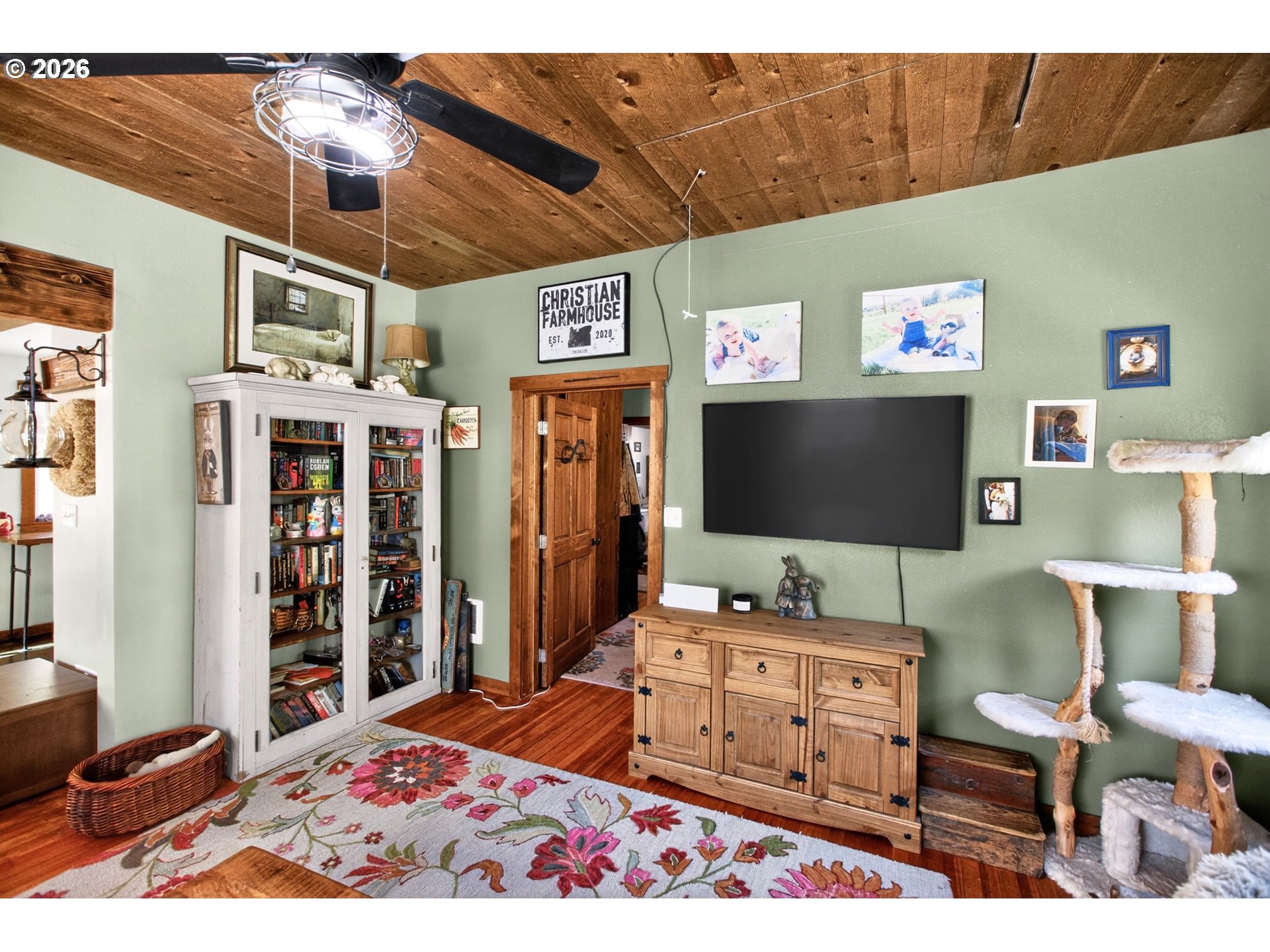 4625 Orchard Road The Dalles, OR 97058 - Photo 9 of 31 a living room with furniture and a flat screen tv