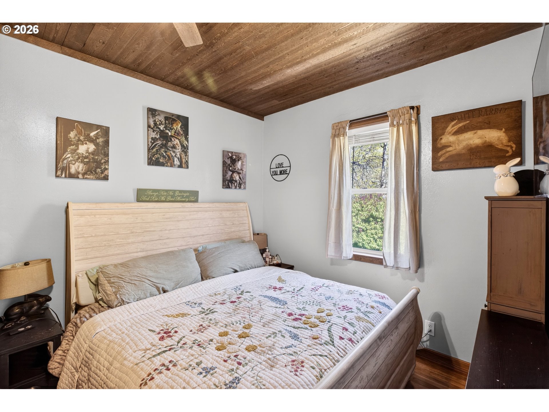 4625 Orchard Road The Dalles, OR 97058 - Photo 10 of 31 a bedroom with a bed and a flat screen tv