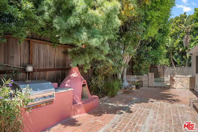 a view of yard with patio