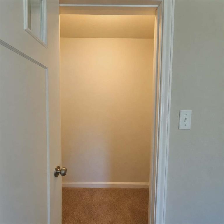 14752 Ranch Road Forney, TX 75126 - Photo 30 of 40 Bedroom 4- Walk in closet-This photo was taken before family moved in