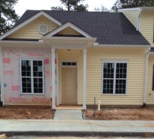 844 Horton Road, Unit 83 Durham, NC 27704 - Photo 2 of 5 Dramatic one-level end unit townhome under construction. Granite and ss in kitchen. Quiet patio and rear yard back up to wooded area. Front View