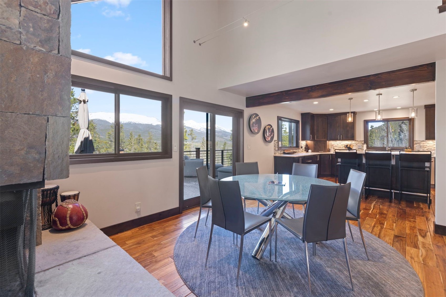 103 Bearing Tree Road Breckenridge, CO 80424 - Photo 11 of 30 a dining room with furniture and wooden floor