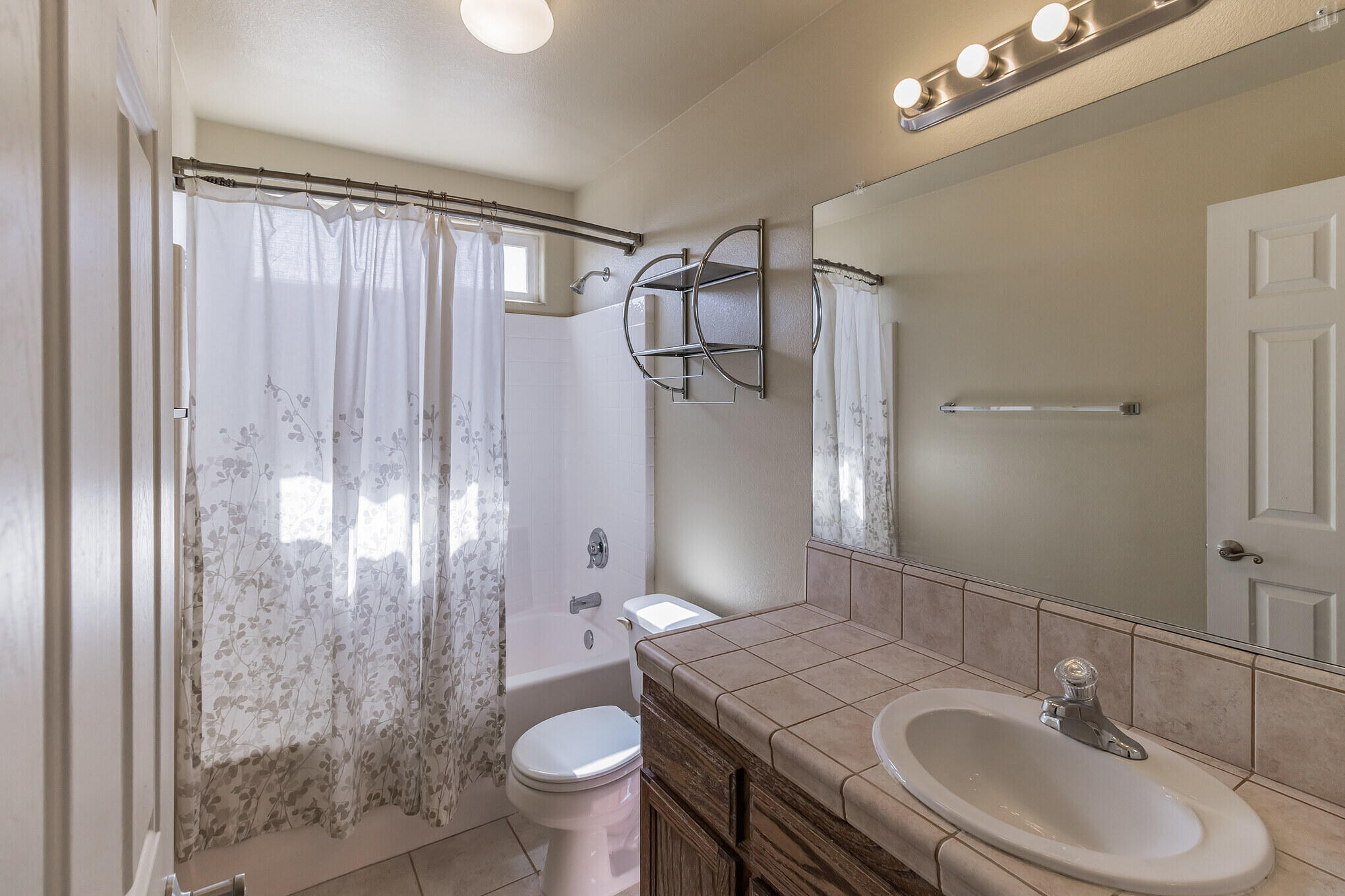 381 Calaveras Road Pinon Hills, CA 92372 - Photo 13 of 27 a bathroom with a sink toilet and shower