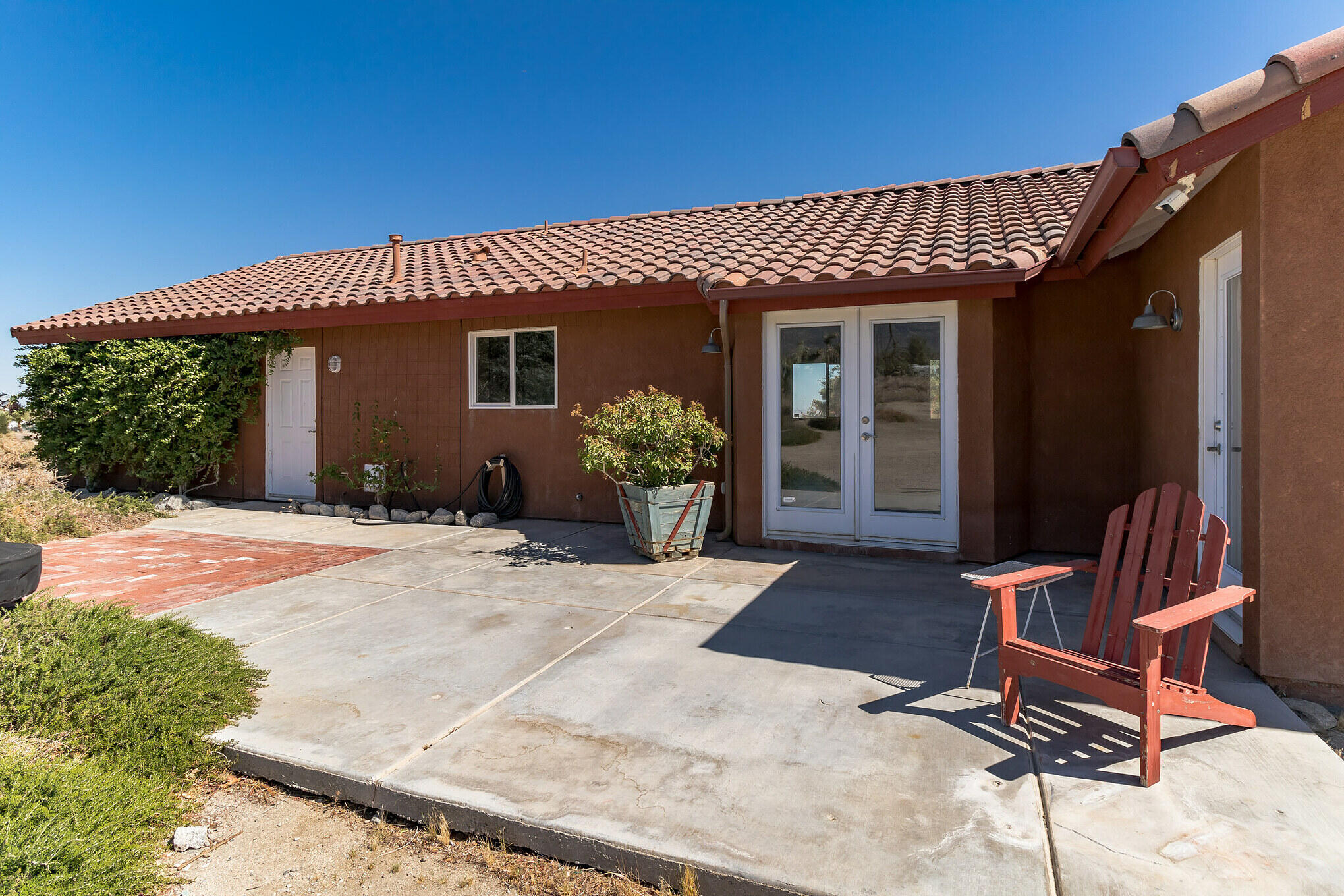 381 Calaveras Road Pinon Hills, CA 92372 - Photo 23 of 27 a view of a house with patio