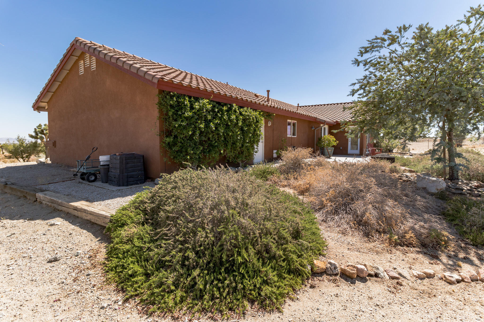 381 Calaveras Road Pinon Hills, CA 92372 - Photo 24 of 27 a backyard of a house