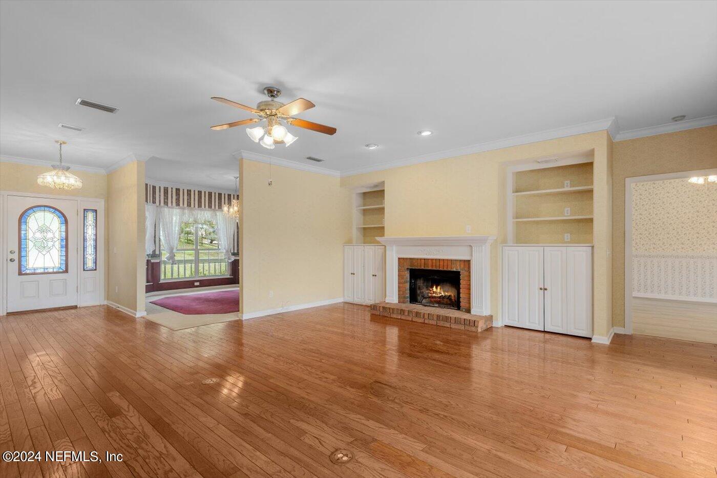 8495 Lilly Lake Road Melrose, FL 32666 - Photo 13 of 60 Family Room w/Fireplace