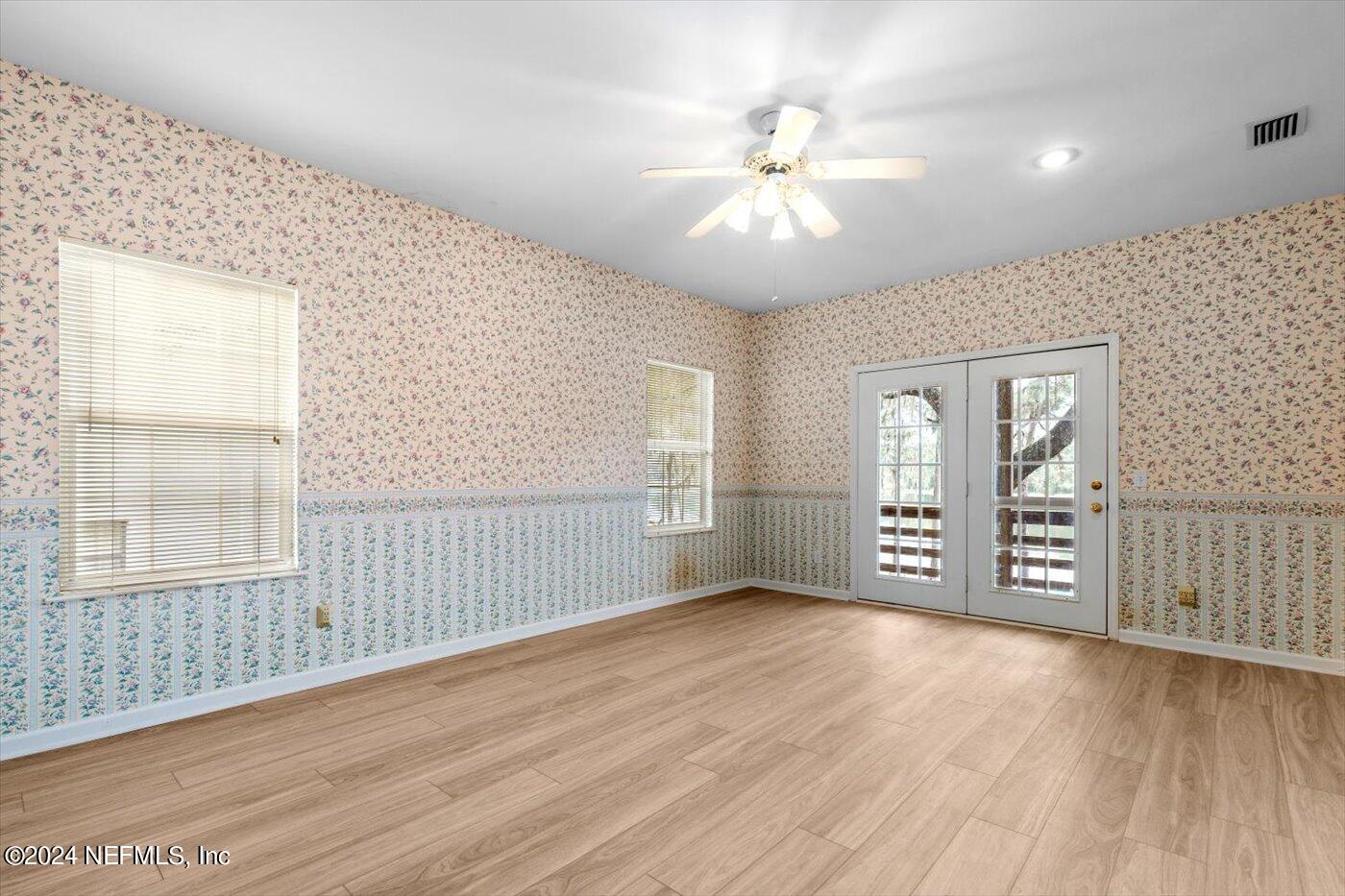 8495 Lilly Lake Road Melrose, FL 32666 - Photo 30 of 60 Master Bedroom w/Balcony