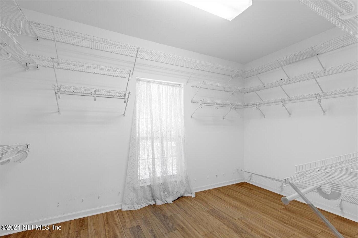 8495 Lilly Lake Road Melrose, FL 32666 - Photo 35 of 60 Master Walk In Closet
