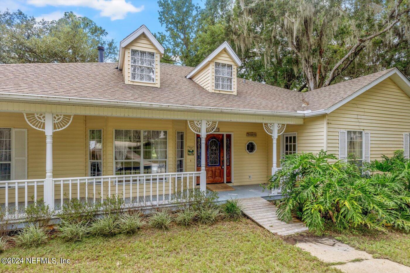8495 Lilly Lake Road Melrose, FL 32666 - Photo 4 of 60 Relaxing Front Porch