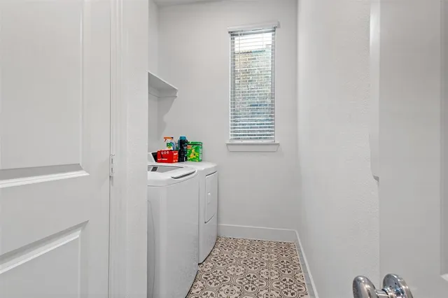 a room with a window and wooden floor