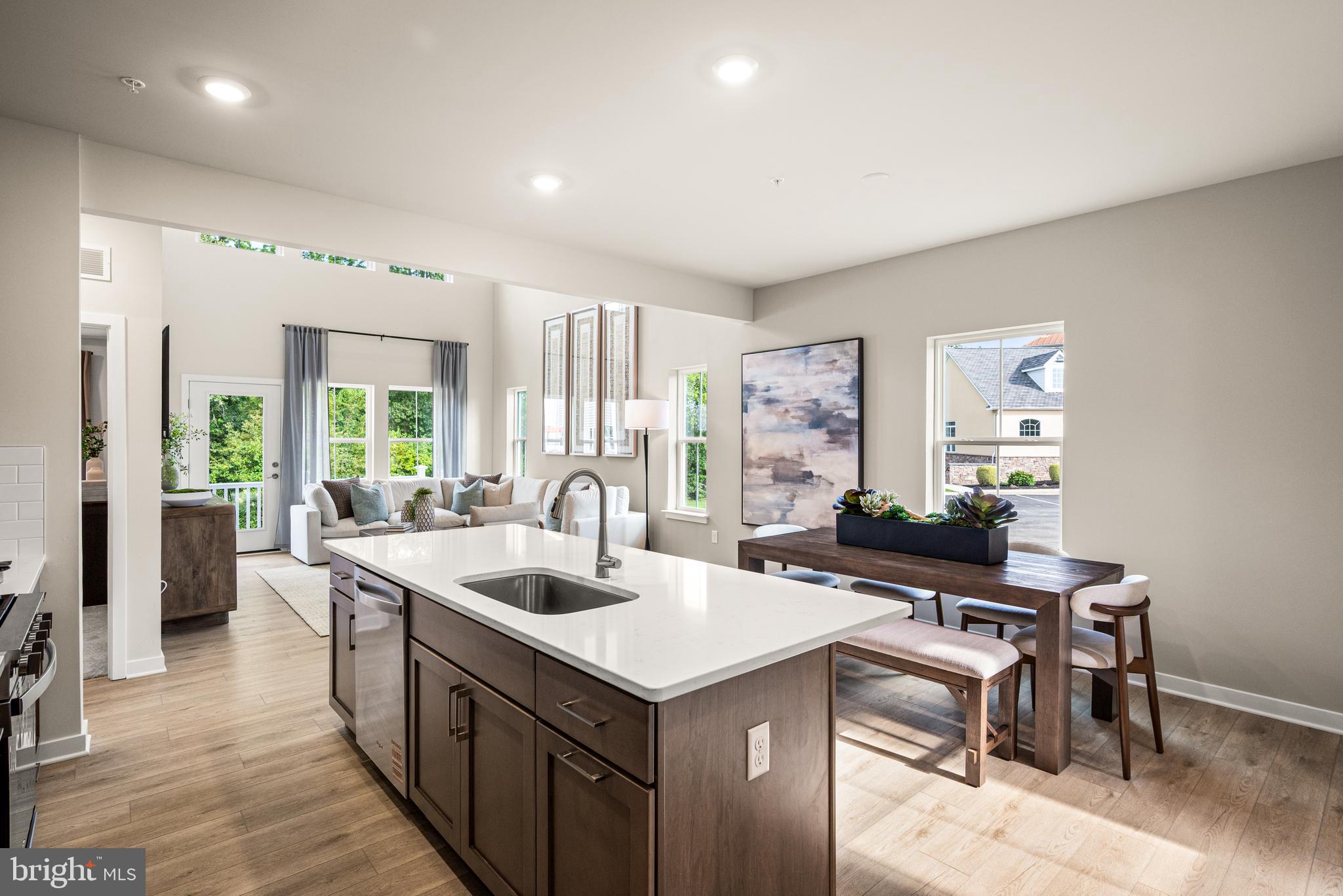 548 Arrowgrass Lane New Castle, DE 19720 - Photo 16 of 48 a kitchen with a stove a refrigerator and a sink