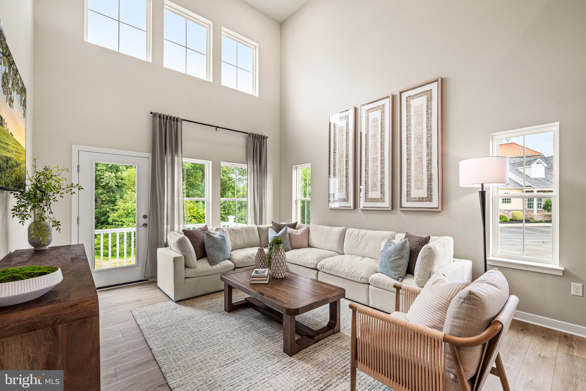548 Arrowgrass Lane New Castle, DE 19720 - Photo 5 of 48 a living room with furniture and a large window