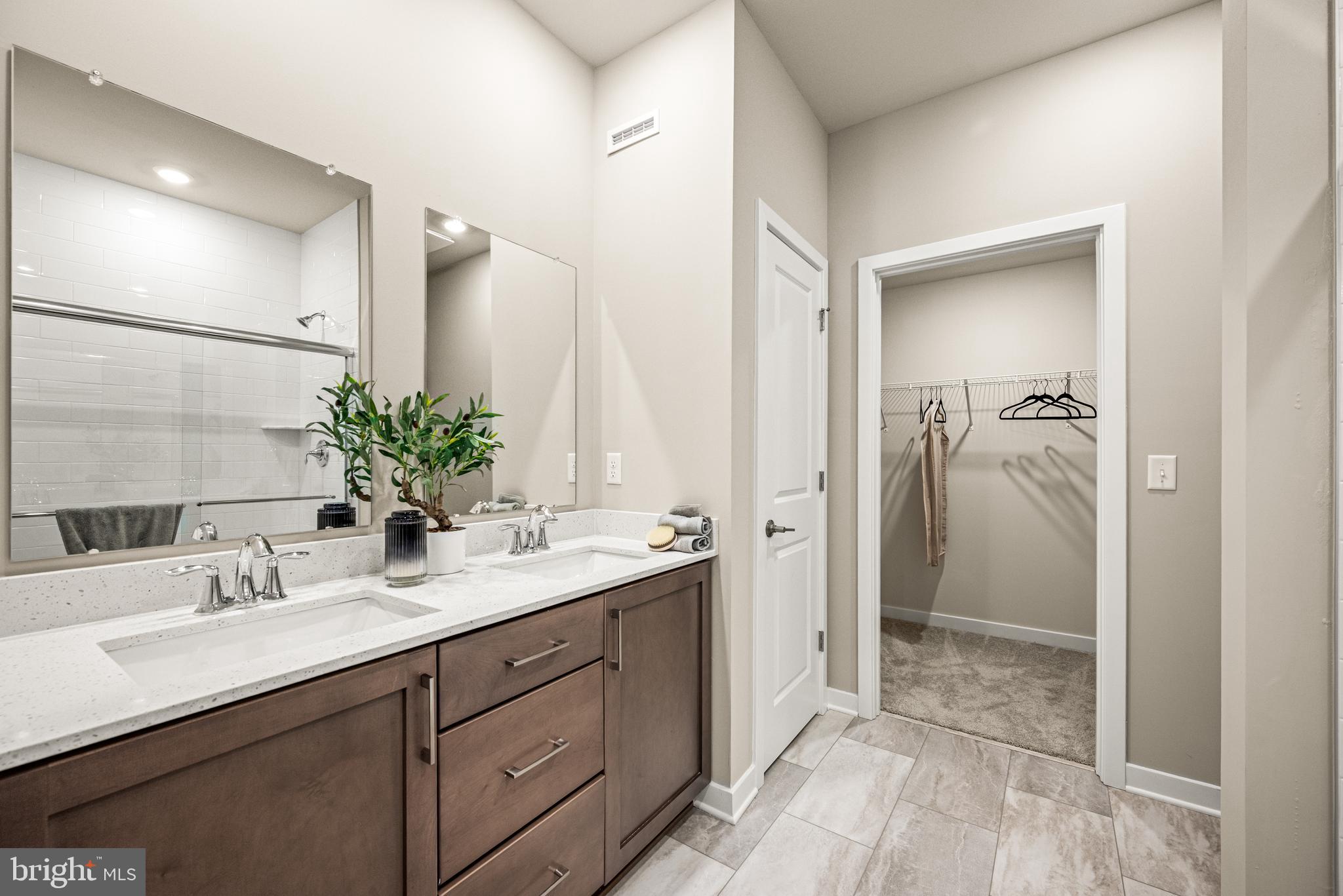 548 Arrowgrass Lane New Castle, DE 19720 - Photo 9 of 48 a bathroom with a sink and mirror