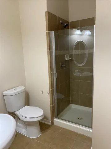 a view of a room that has a window in it