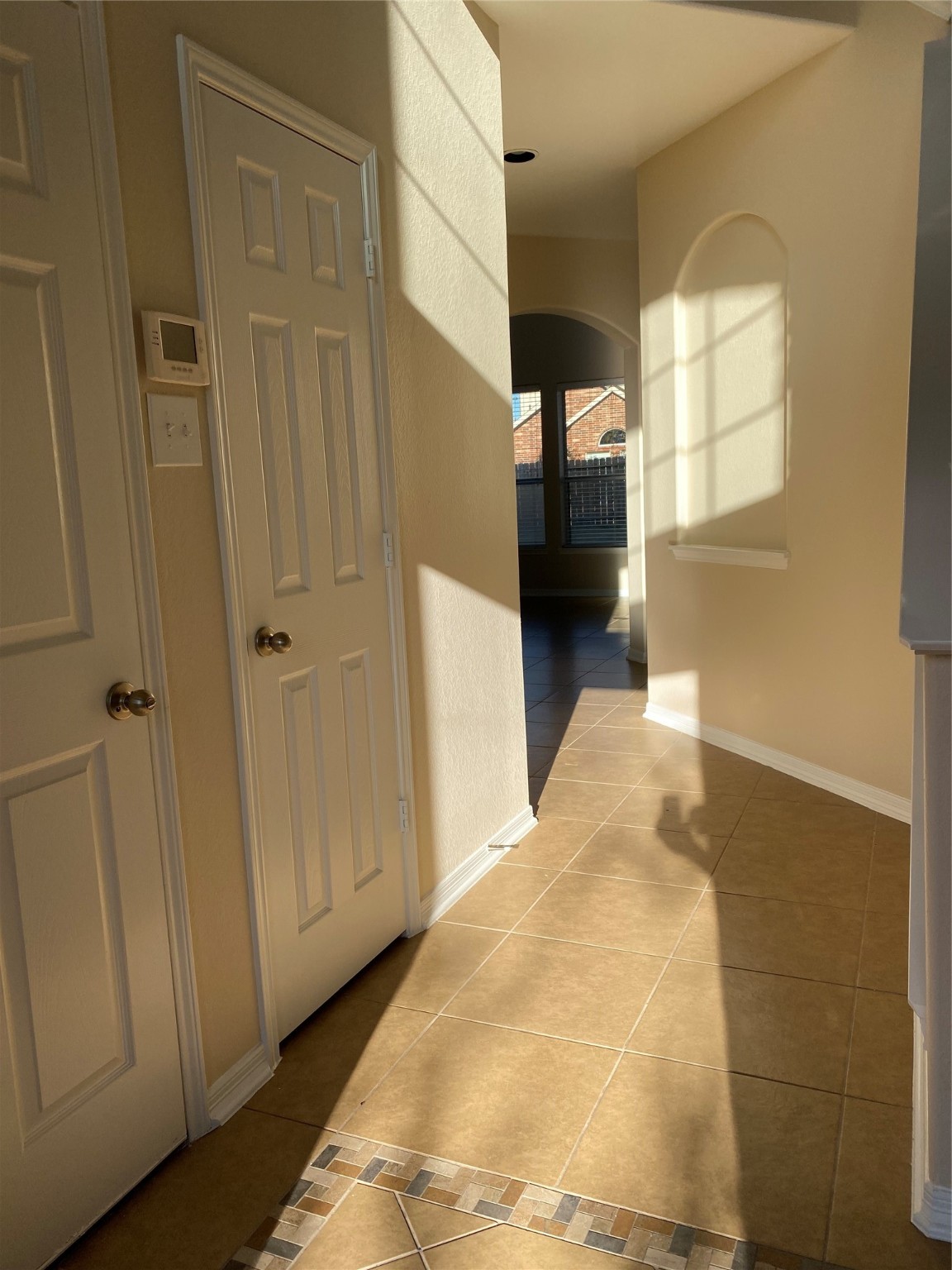 10930 Reston Point Drive Richmond, TX 77406 - Photo 4 of 26 a view of a hallway with windows