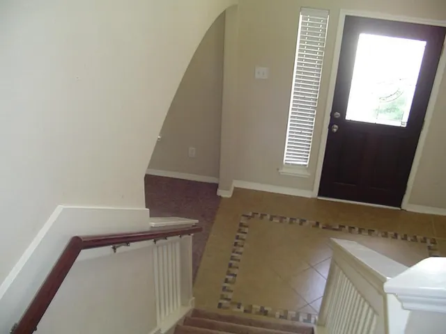 a view of an entryway with a window