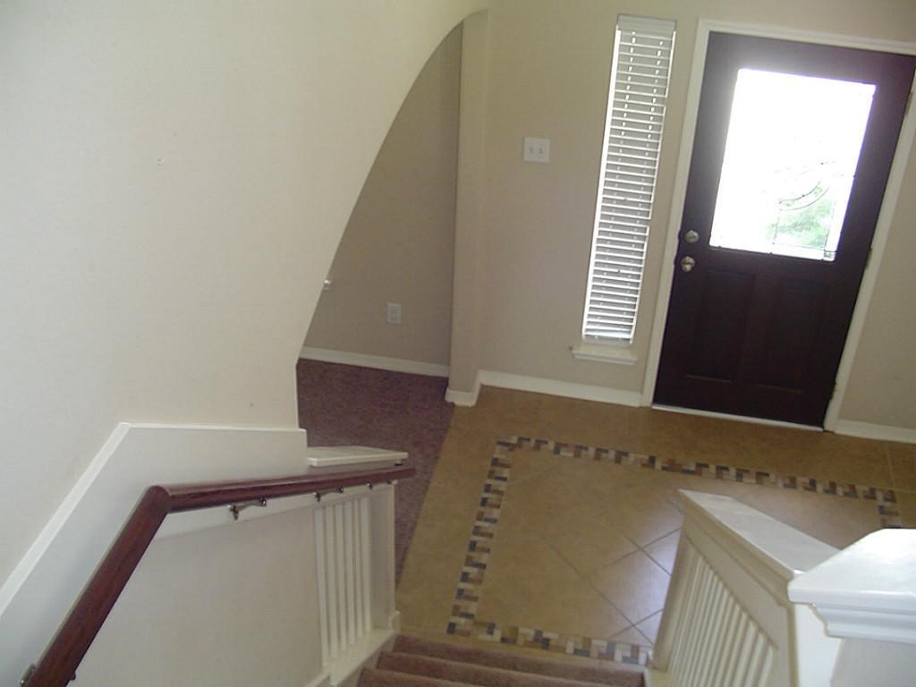 10930 Reston Point Drive Richmond, TX 77406 - Photo 9 of 26 a view of an entryway with a window