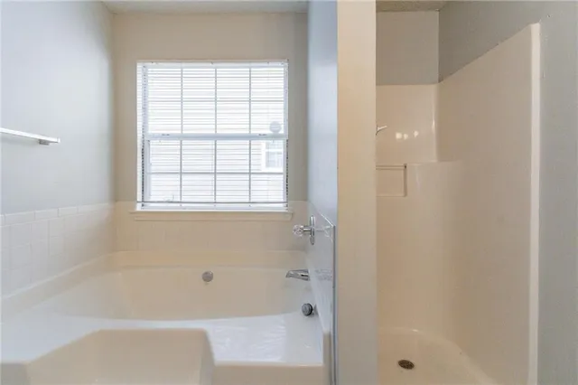 a bathroom with a bathtub