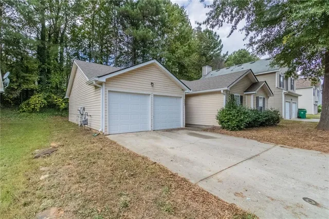 front view of a house with a street