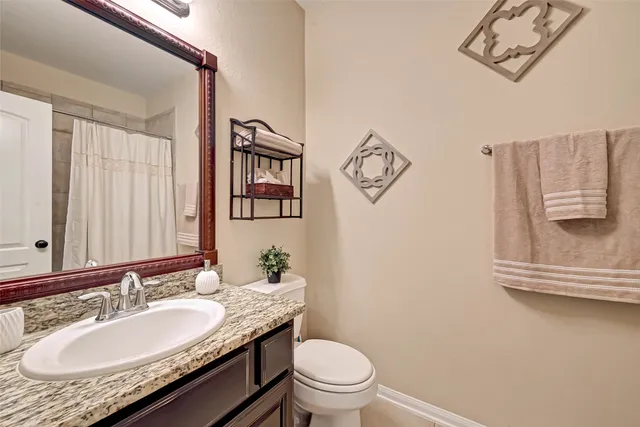 a bathroom with a shower and a tub