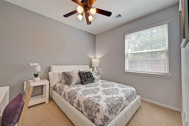 a view of a balcony with furniture