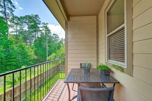 a view of a two chairs in the roof deck