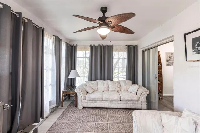 a living room with furniture and a window