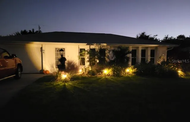 a view of a house with a ocean view