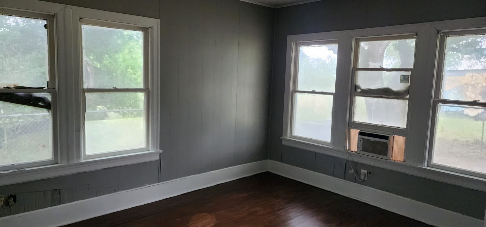 18327 Blake Manor Road, Unit A Manor, TX 78653 - Photo 16 of 21 Unfurnished room with dark wood finished floors and cooling unit
