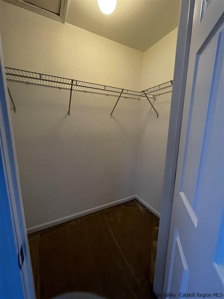1036 Maggie Road, Unit 148 Newburgh, NY 12550 - Photo 17 of 19 a view of a room with racks on the wall