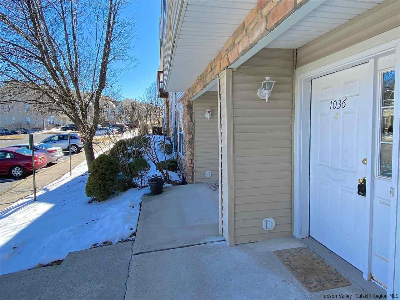 1036 Maggie Road, Unit 148 Newburgh, NY 12550 - Photo 2 of 19 a view of a door and a yard